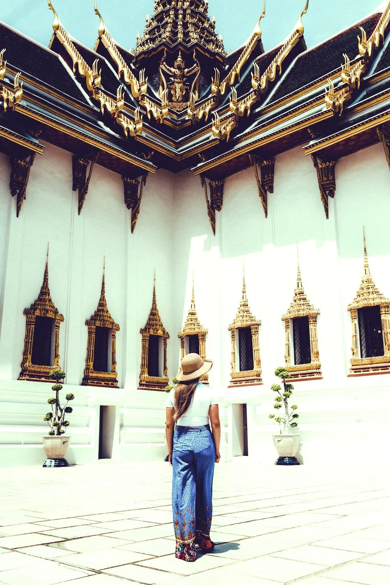 man looking at building